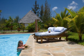 Гостиница Sheba Cottages - Diani Beach  Diani Beach